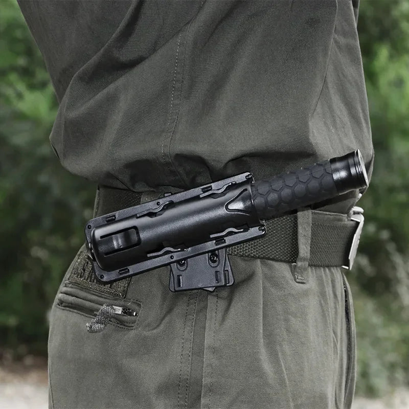 Retractable baton holster rotates 360 degrees